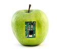 Apple with an integrated circuit Royalty Free Stock Photo