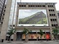 Apple Iphone 6 camera ad on the side of building with Loft store