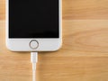 Apple iPhone6 Charging with Lightning USB Cable Royalty Free Stock Photo