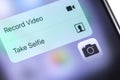 Apple iPhone displaying the official Camera icon app and context menu buttons