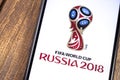 Apple iPhone with FIFA World Cup Russia 2018 logo. Ekaterinburg, Russia - May 11, 2018 Royalty Free Stock Photo