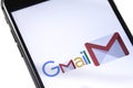 Apple iPhone with Gmail logo on the white background. Russia - O