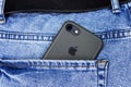 Apple iPhone in a pocket of worn jeans Royalty Free Stock Photo