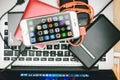 Apple iPhone 6S placed on Macbook Laptop Royalty Free Stock Photo
