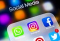 Apple iPhone X with icons of social media facebook, instagram, twitter, snapchat application on screen. Social media icons. Social Royalty Free Stock Photo