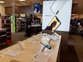 Apple iPhone X and iPad with siri assistant on display inside a Best Buy Royalty Free Stock Photo