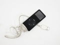 apple ipod nano with charging cable Royalty Free Stock Photo