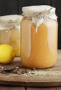 Apple jam jars canned in plastic free glass cans on wooden rustic pantry background, closeup Royalty Free Stock Photo