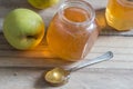 Apple jelly jam on wooden table with apples - selective focus on Royalty Free Stock Photo