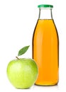 Apple juice in a glass bottle and ripe apple