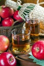 Apple juice in glasses, apples and bottle Royalty Free Stock Photo