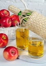 Apple juice in glasses and apples Royalty Free Stock Photo