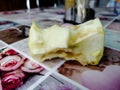 Apple core laid on the kitchen table