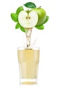 Apple juice pouring out from fruit into glass Royalty Free Stock Photo