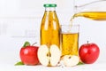 Apple juice pouring pour apples fruit fruits bottle copyspace Royalty Free Stock Photo