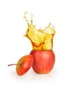 Apple juice splashing Royalty Free Stock Photo