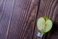 apple - light bulb on wooden background