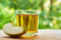 Apple lobule and glass on the table