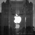 Apple logo on the glass front on black and white.