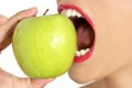 Apple macro on woman mouth detail of bite Royalty Free Stock Photo
