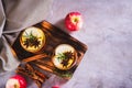 Apple margarita with spices and rosemary in glasses on the table top view Royalty Free Stock Photo