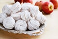 Apple marshmallows in a metal bowl on a light background Royalty Free Stock Photo