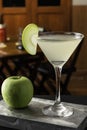 Apple Martini cocktail is on the bar. Space for text. Photo for the menu Royalty Free Stock Photo