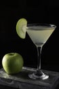 Apple Martini cocktail is on the bar. Space for text. Photo for the menu Royalty Free Stock Photo