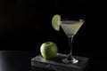 Apple Martini cocktail is on the bar. Space for text. Photo for the menu Royalty Free Stock Photo