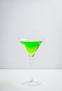 Apple martini cocktail on the white rustic background Royalty Free Stock Photo