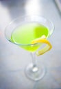 Apple martini with a lemon twist Royalty Free Stock Photo