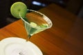 Apple Martini mixed drink with fruit slice garnish Royalty Free Stock Photo