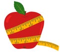 Apple with measuring tape