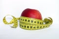 Apple with measuring tape Royalty Free Stock Photo