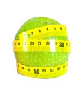Apple with a measuring tape on a white background