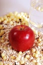 Apple on muesli background Royalty Free Stock Photo