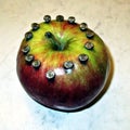 Apple with nails