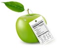An apple with a nutrition facts label. Royalty Free Stock Photo