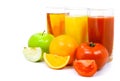 Apple orange and tomato fruits with juice in glass Royalty Free Stock Photo