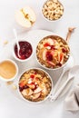 Apple peanut butter quinoa bowl with jam and cashew for healthy