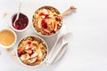 Apple peanut butter quinoa bowl with jam and cashew for healthy breakfast