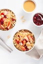 Apple peanut butter quinoa bowl with jam and cashew for healthy breakfast