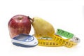 Apple, pear, tape and glucometer