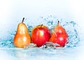 Apple, pear and water Royalty Free Stock Photo