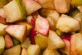 apple and pears pieces, sugar and syrup in pan, ready for boiling. Homemade red apple and pears jam, process of cooking