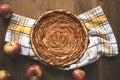 Apple pie in flower shape on wooden table. Traditional dessert