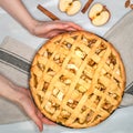 Apple pie, hands, apples, cinnamon, sugar, top view Royalty Free Stock Photo