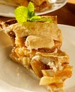 Apple pie with mint garnish. Royalty Free Stock Photo