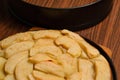 Apple pie near baking tray on table Royalty Free Stock Photo