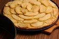 Apple pie near baking tray on table Royalty Free Stock Photo